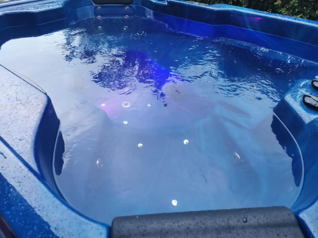 Bazén v ubytování Maison Time Break Jacuzzi - 4 étoiles nebo v jeho okolí