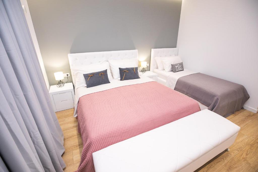 Postel nebo postele na pokoji v ubytování Hotel Elior