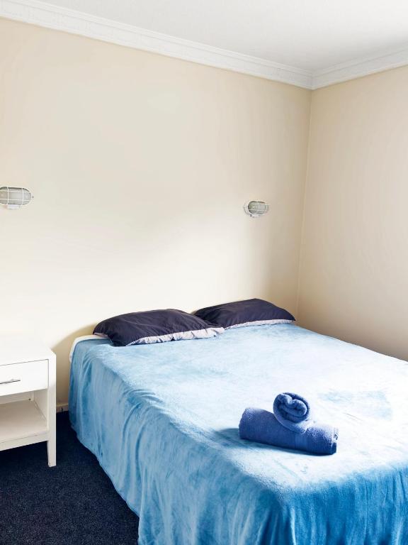 Postel nebo postele na pokoji v ubytování Ferry Motel