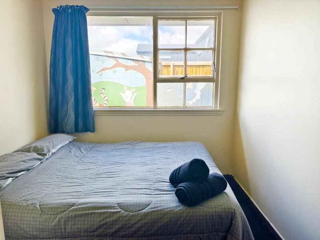 Postel nebo postele na pokoji v ubytování Ferry Motel