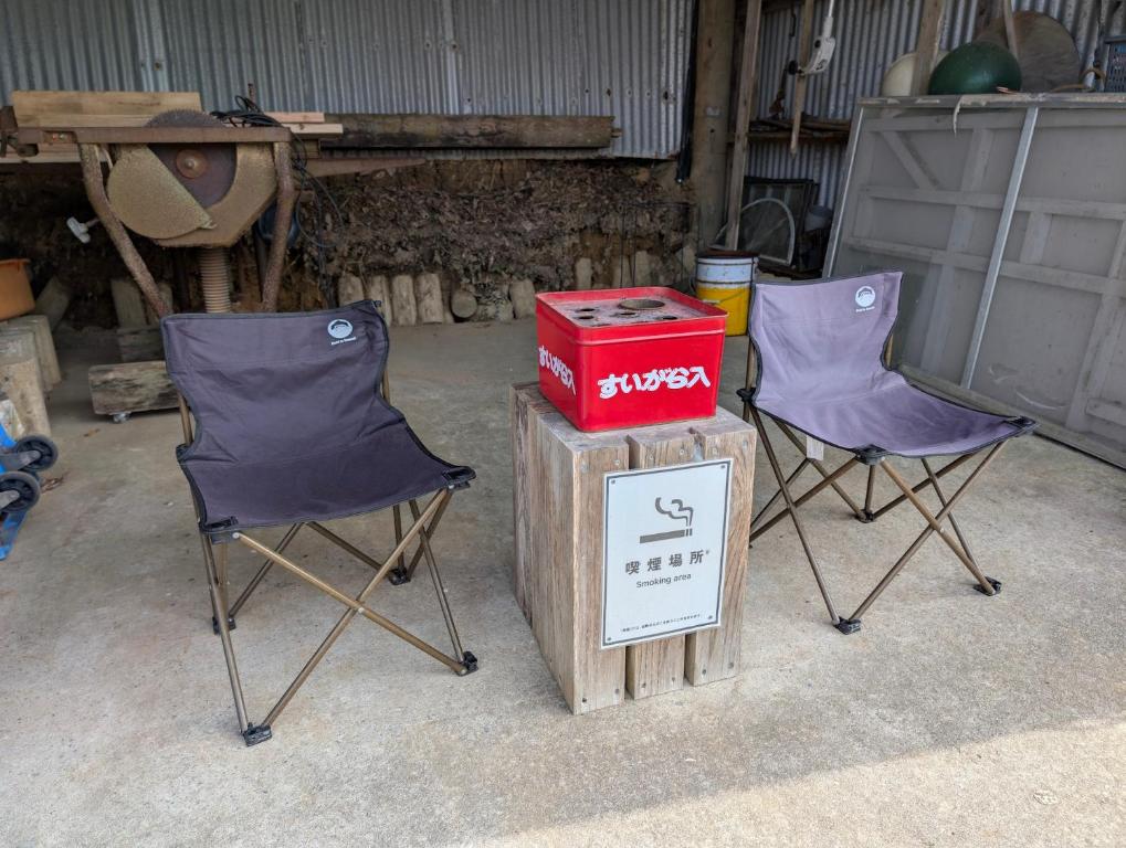 two chairs and a box on top of a box at Seiryukyou in Nishinoomote
