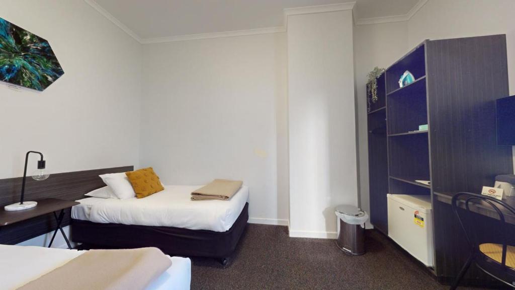 Postel nebo postele na pokoji v ubytování Doctor Syntax Hotel