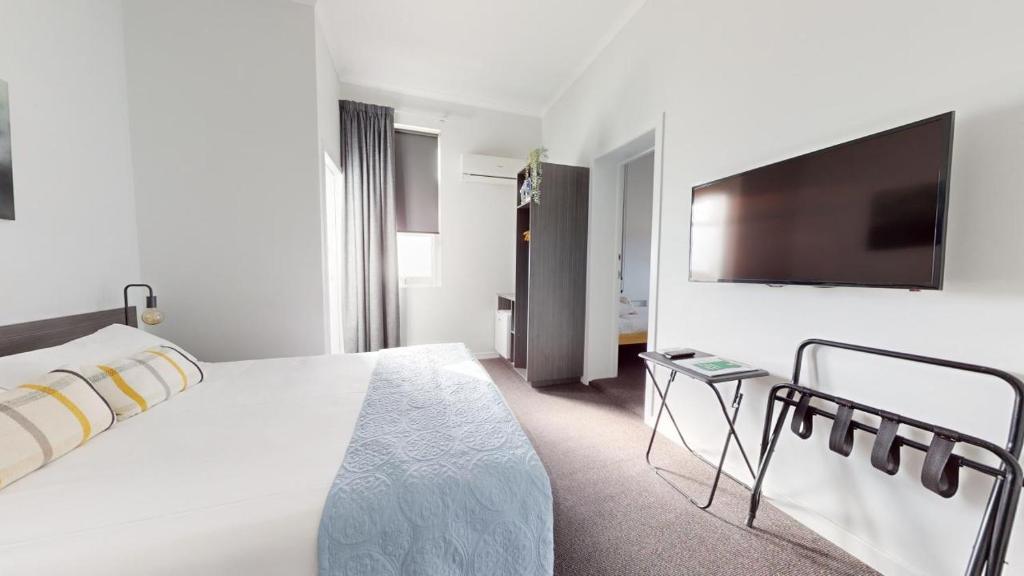 Postel nebo postele na pokoji v ubytování Doctor Syntax Hotel