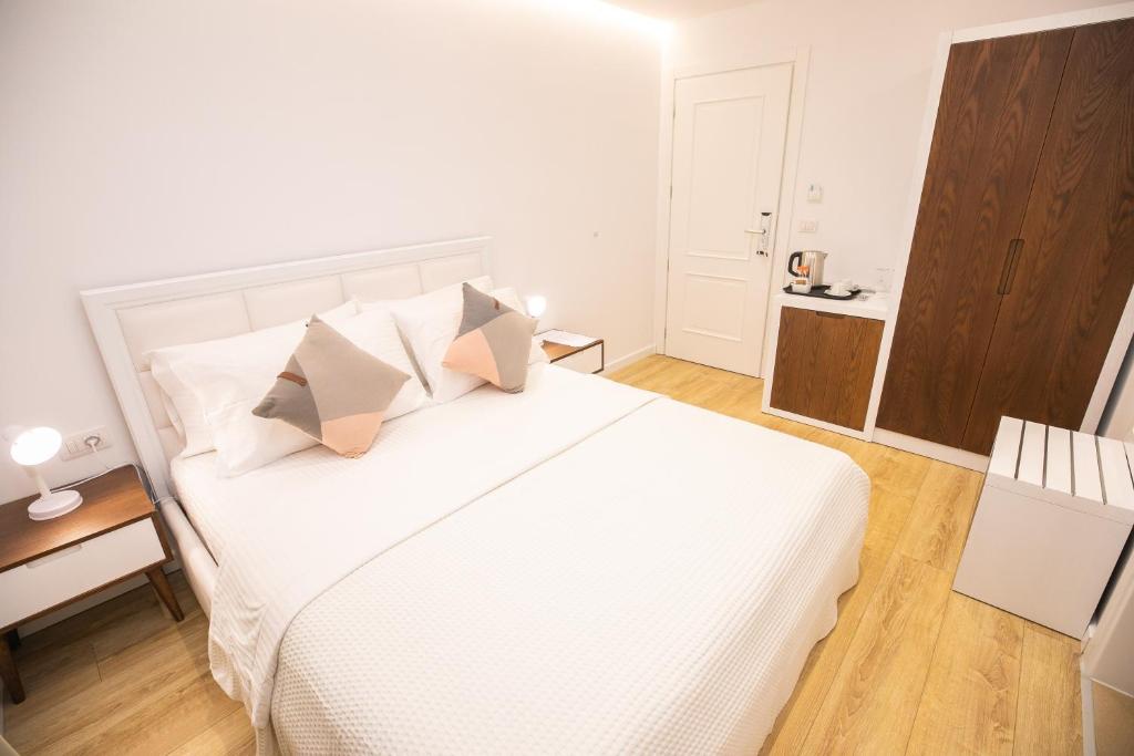 Postel nebo postele na pokoji v ubytování Hotel Elior