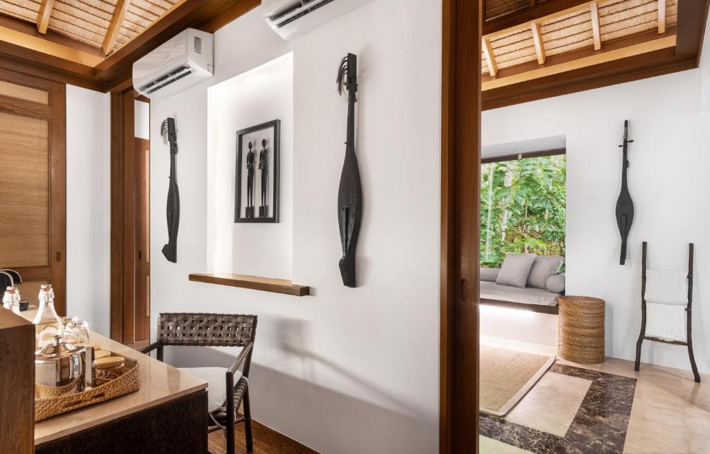 Posezení v ubytování El Nido Resorts Pangulasian Island