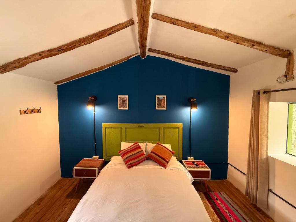 Voodi või voodid majutusasutuse Anido Hotel toas