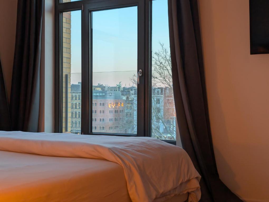 Voodi või voodid majutusasutuse Luxury Duplex Suite 2-Story toas