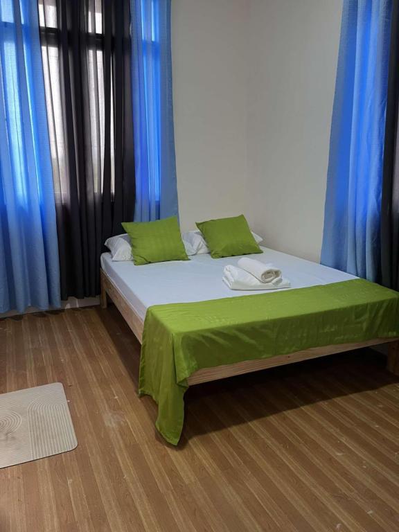 Postel nebo postele na pokoji v ubytování Baden Powell Hostel