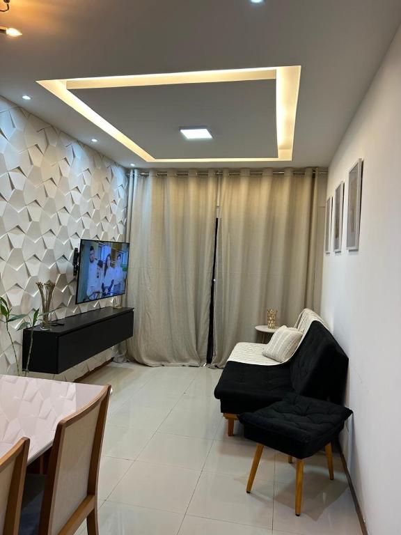 TV a/nebo společenská místnost v ubytování Ap 3Q, elegante e funcional, com estacionamento