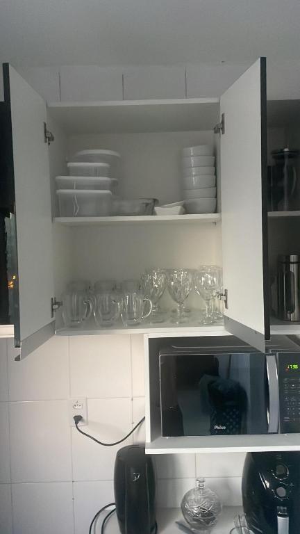 Kuchyň nebo kuchyňský kout v ubytování Ap 3Q, elegante e funcional, com estacionamento