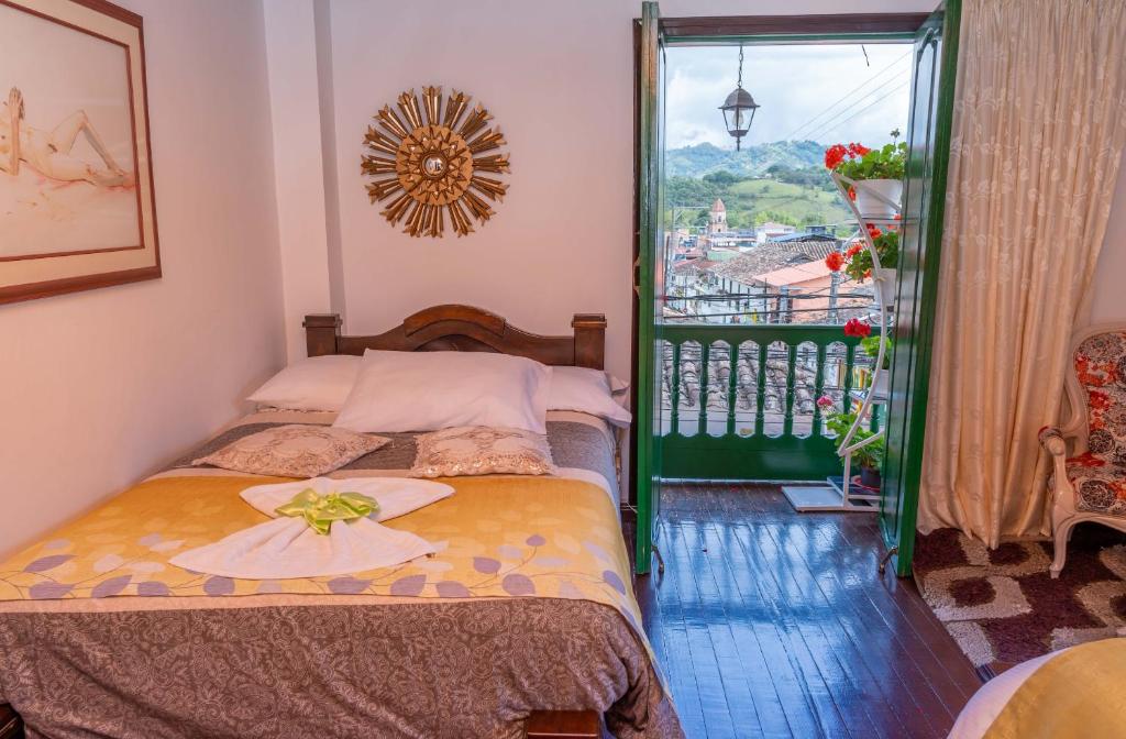 Postel nebo postele na pokoji v ubytování HOTEL LA CASONA SAN AGUSTIn