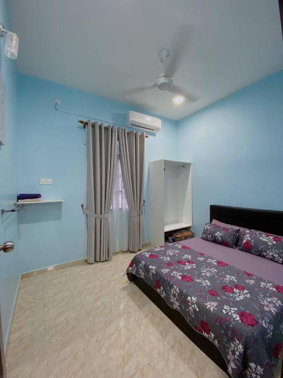 Postel nebo postele na pokoji v ubytování NSJay Guest House
