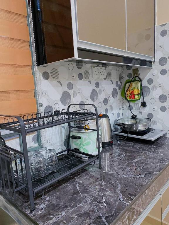 Kuchyň nebo kuchyňský kout v ubytování NSJay Guest House