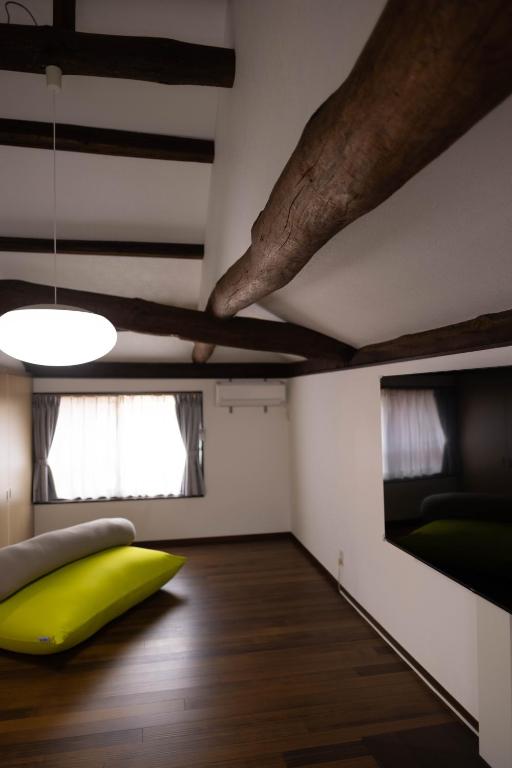 Postel nebo postele na pokoji v ubytování MEMORY GATEWAY HOTEL 101 Katayamatei