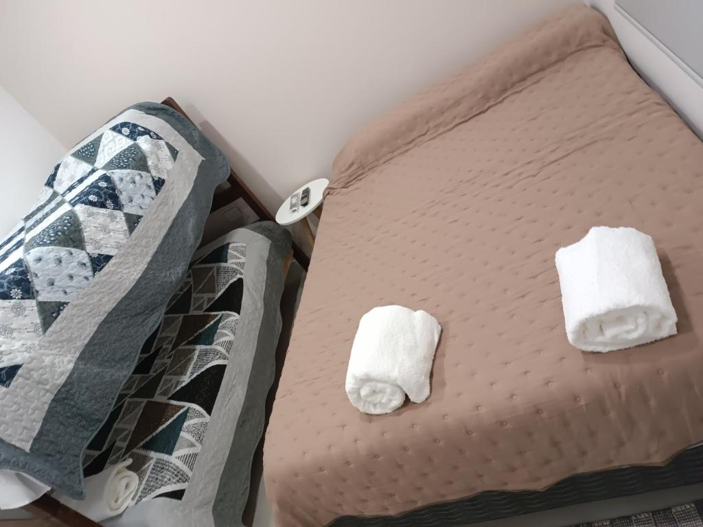 Voodi või voodid majutusasutuse Hospedaje J&B toas