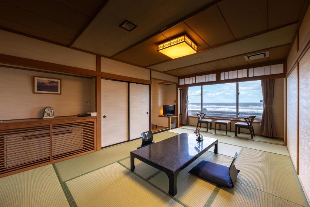 Posezení v ubytování Ikkyu -Seaside Hotel-