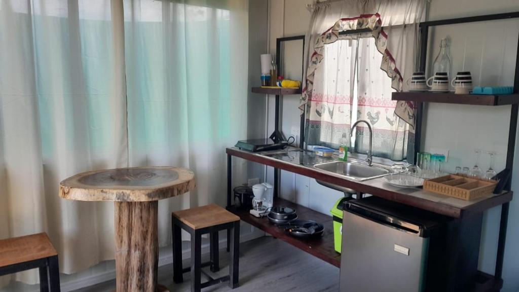 Kuchyň nebo kuchyňský kout v ubytování Apartamentos Equipados DMR #3