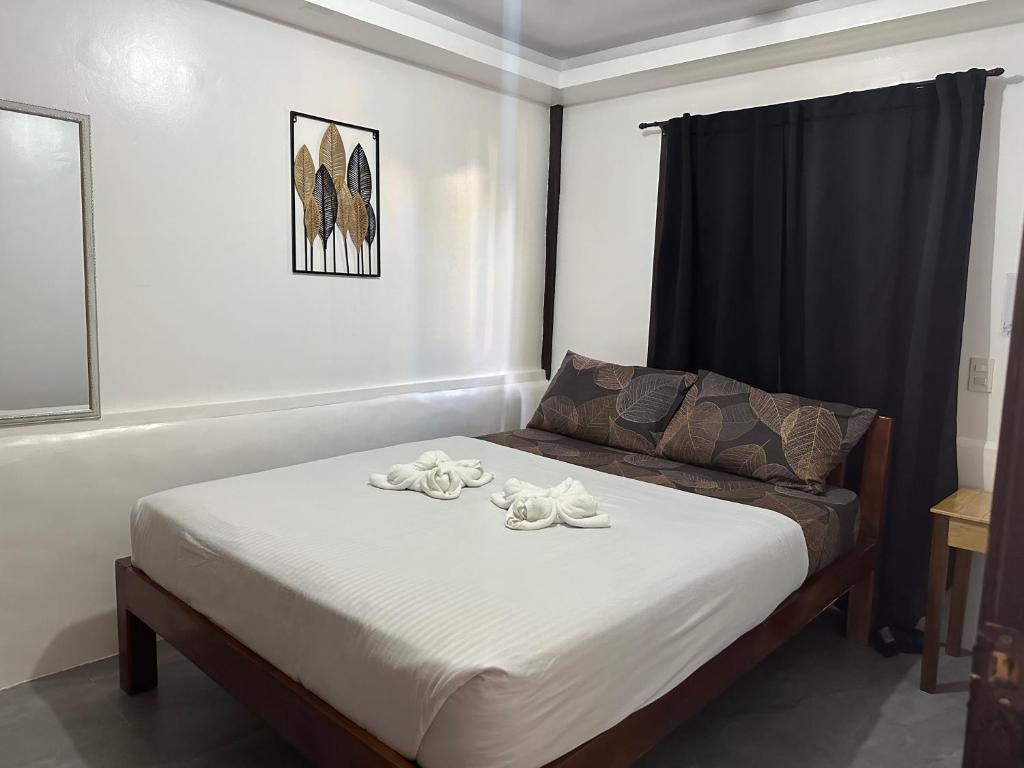 Voodi või voodid majutusasutuse Trisha Guesthouse toas