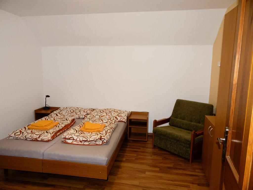 Postel nebo postele na pokoji v ubytování Penzion Čekanka