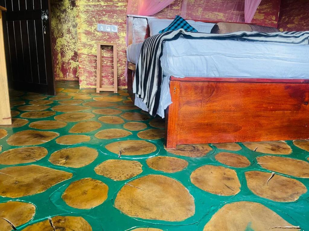 Postel nebo postele na pokoji v ubytování Nine Arch Jungle Inn