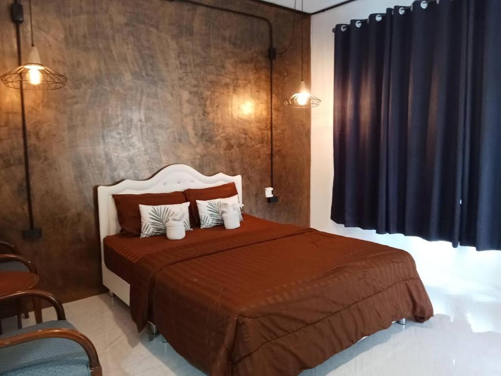 Postel nebo postele na pokoji v ubytování Khlong Thom Resort