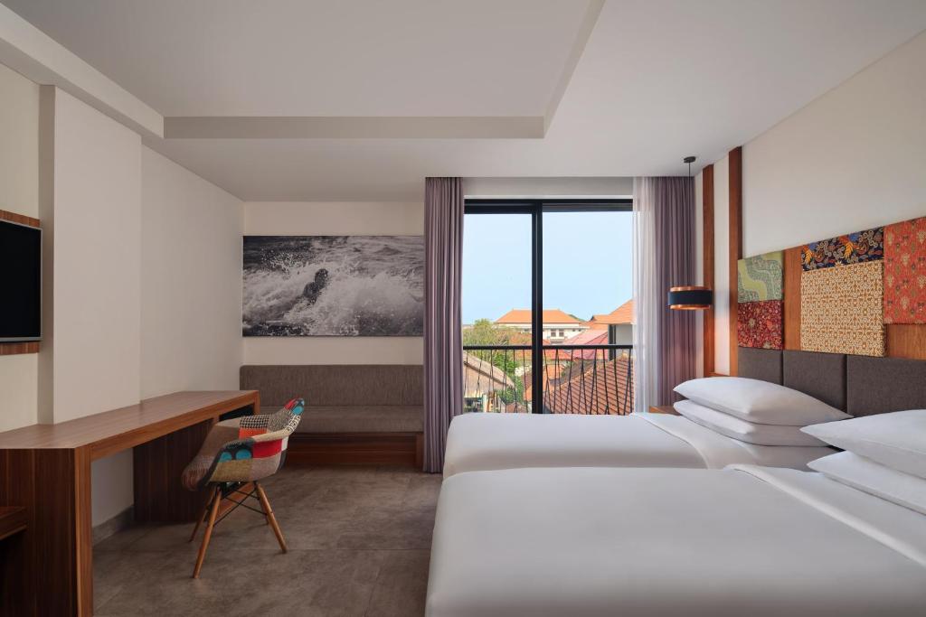Postel nebo postele na pokoji v ubytování Fairfield by Marriott Bali South Kuta