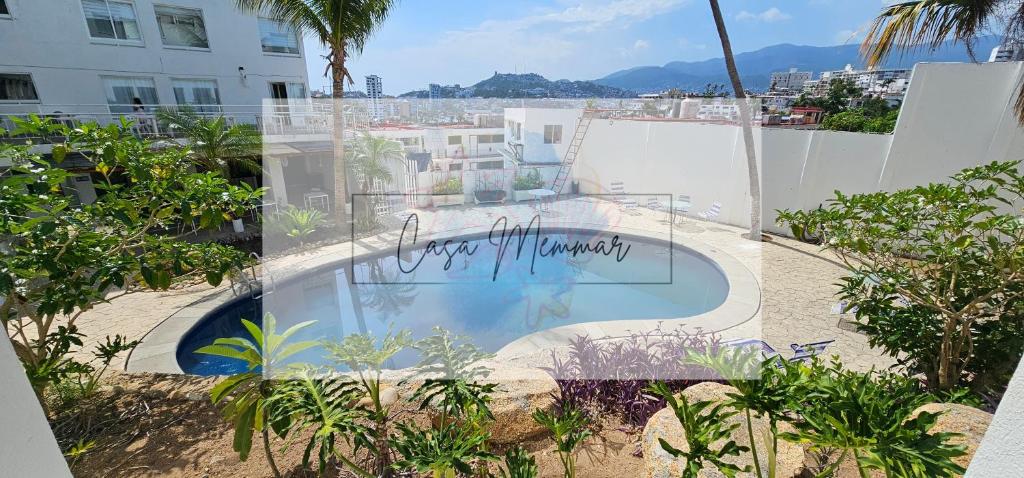 a view of a swimming pool on top of a building at Casa Memmar in Acapulco