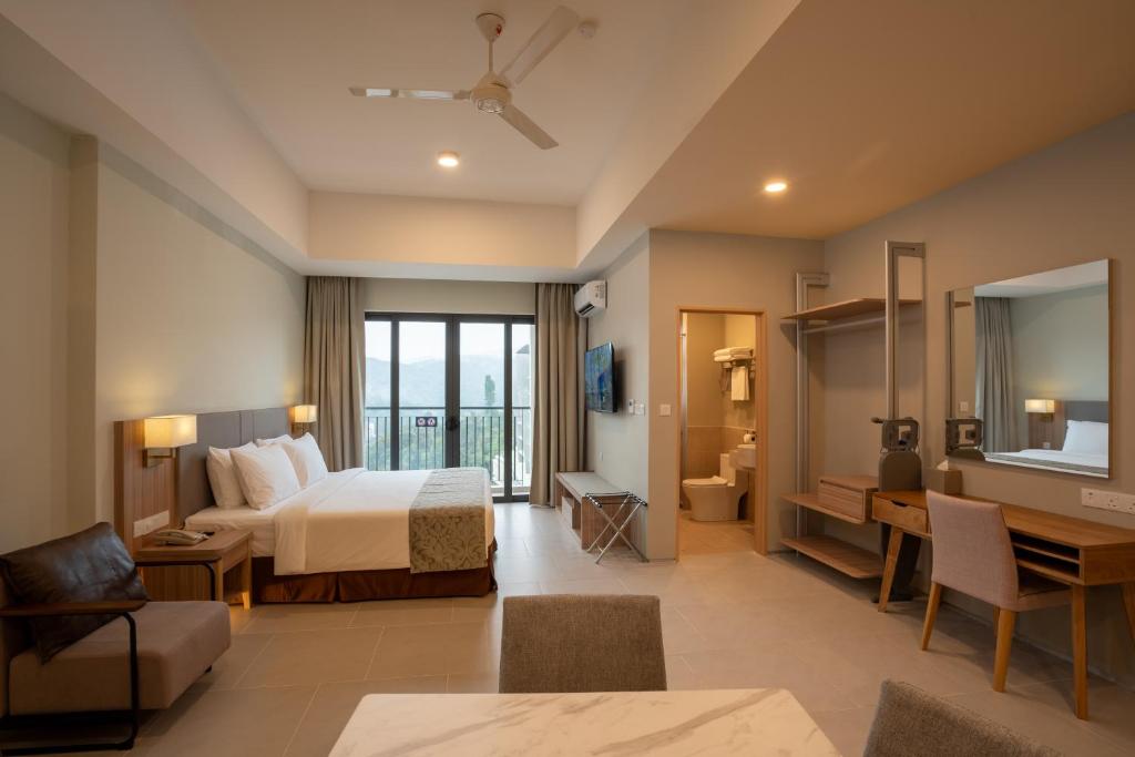 Ein Bett oder Betten in einem Zimmer der Unterkunft Zenith Suites Cameron