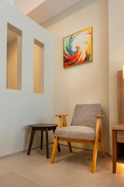 Ein Sitzbereich in der Unterkunft Zenith Suites Cameron