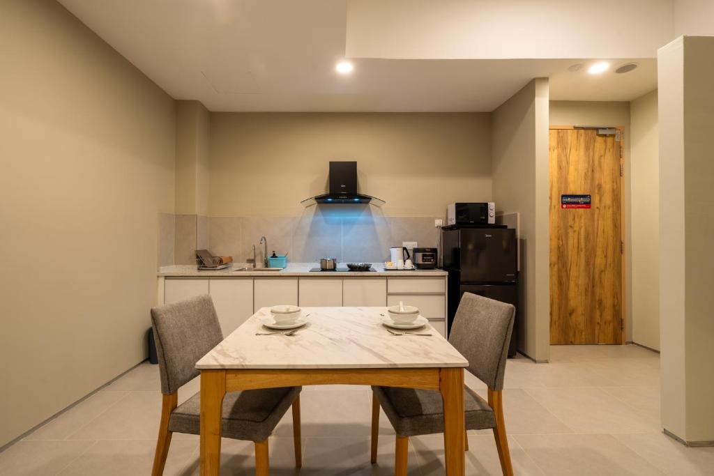 Posezení v ubytování Zenith Suites Cameron