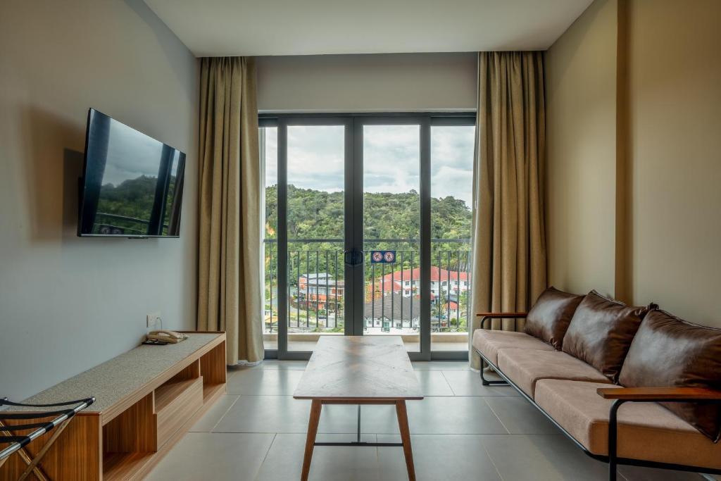 TV&#47;Unterhaltungsangebot in der Unterkunft Zenith Suites Cameron