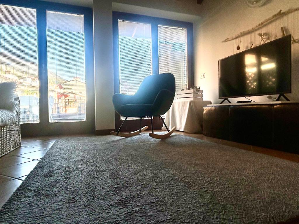 Televízia a/alebo spoločenská miestnosť v ubytovaní Gabriel’s Home