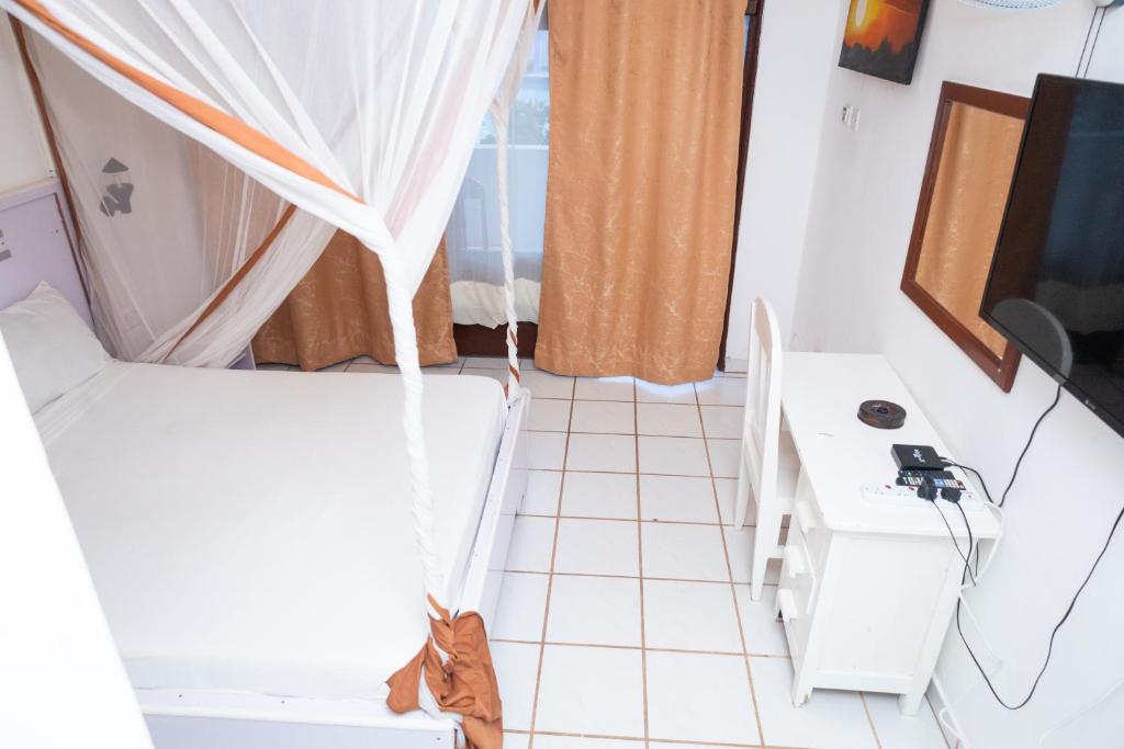 Fotografie z fotogalerie ubytování Diani Palm Resort and Apartments v destinaci Diani Beach