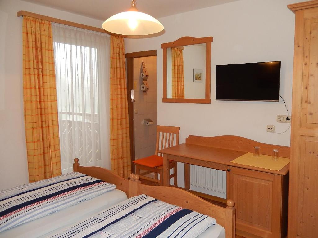 TV a/nebo společenská místnost v ubytování Haus Seehof