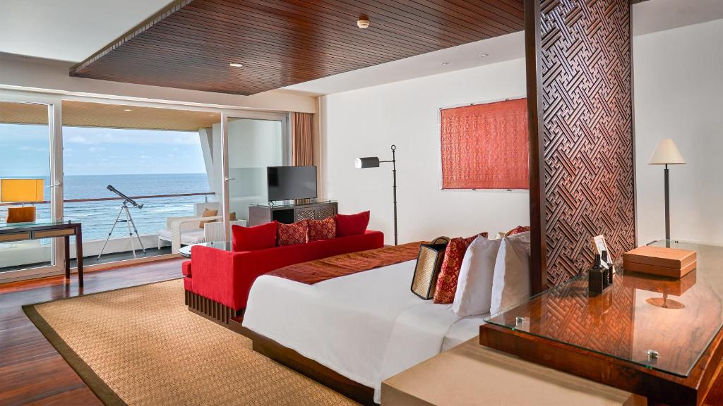 Postel nebo postele na pokoji v ubytování Samabe Bali Suites & Villas