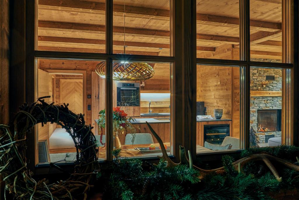 Televiisor ja/või meelelahutuskeskus majutusasutuses Sissi´s green Chalets