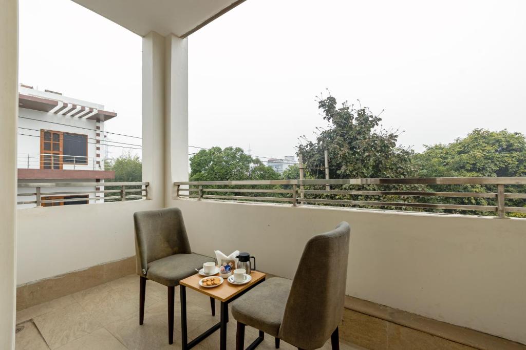 Balkón nebo terasa v ubytování Aadat Hotel Subhash Chowk Gurgaon