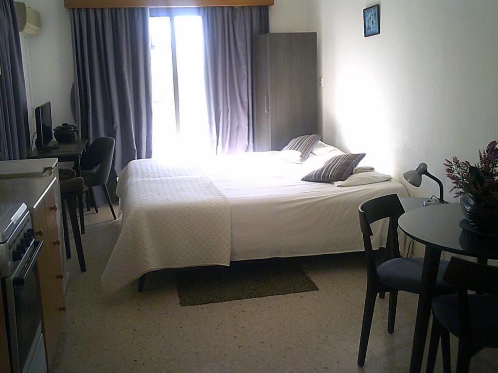 Postel nebo postele na pokoji v ubytování Panklitos Tourist Apartments