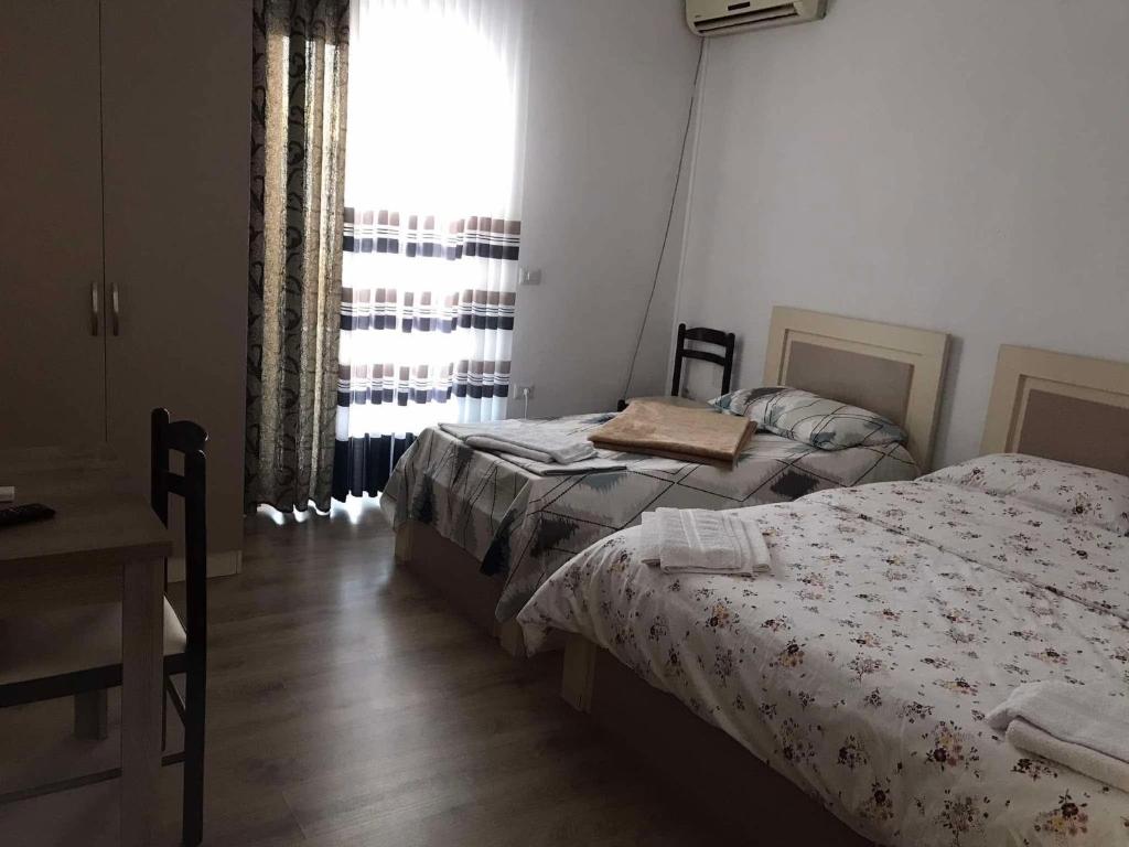 Postel nebo postele na pokoji v ubytování Villa Rejan