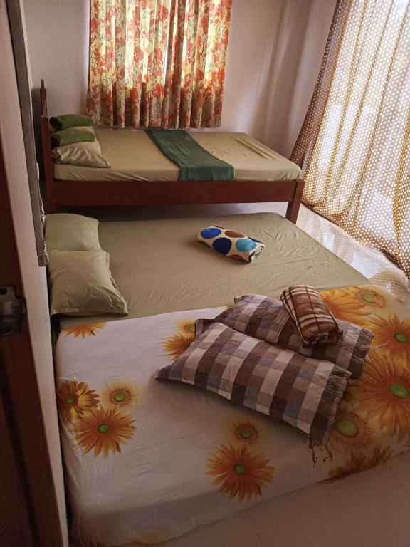 Postel nebo postele na pokoji v ubytování Room in BB - Aremen Transient, Nipa Hut