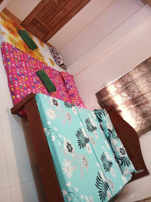 Postel nebo postele na pokoji v ubytování Room in BB - Aremen Transient, Nipa Hut