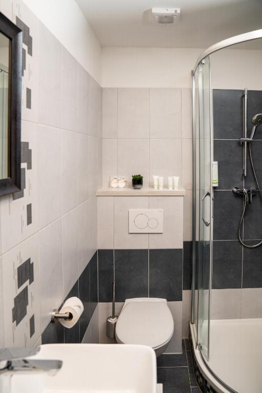 Koupelna v ubytování Hotel Grunt