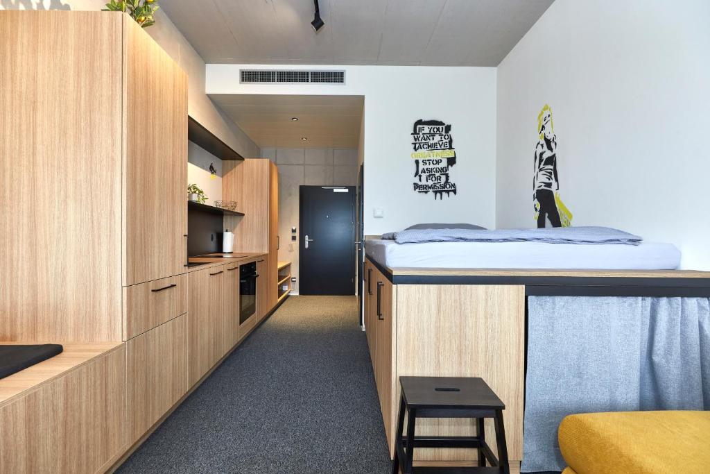 Kuchyň nebo kuchyňský kout v ubytování miniLOFT apartments Leonding 24 hours
