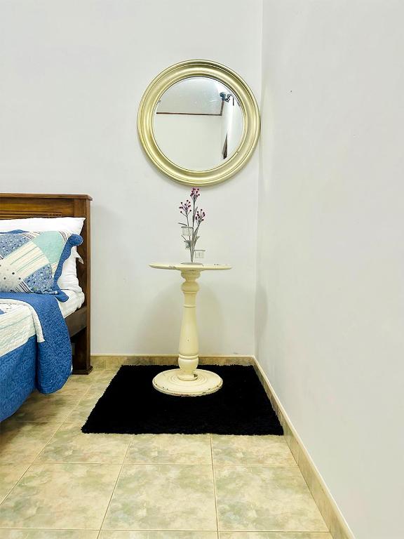 Postel nebo postele na pokoji v ubytování Sea Breeze Guest House Negombo