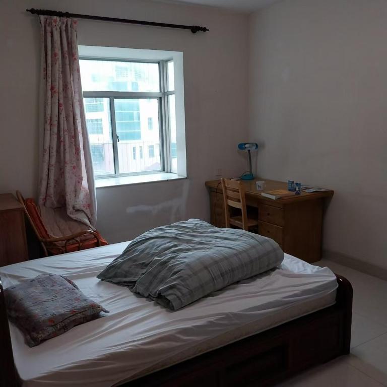 Postel nebo postele na pokoji v ubytování Youyou B&B