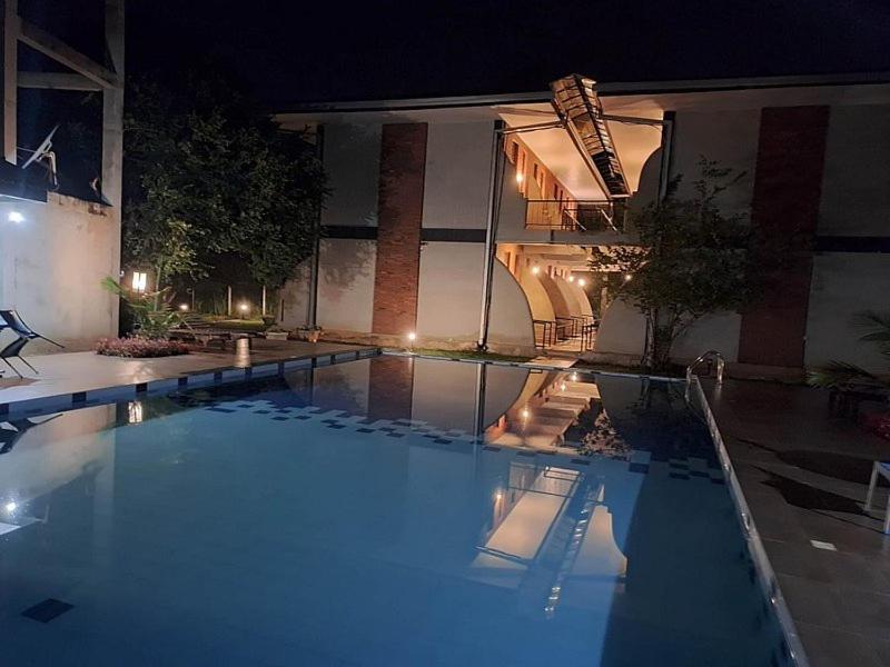 Bazén v ubytování Peacock Eco Resort Sigiriya nebo v jeho okolí