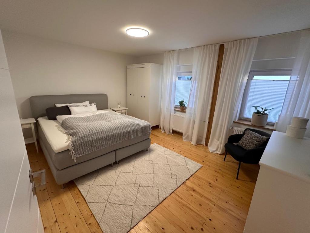 Postel nebo postele na pokoji v ubytování Ferienapartment Mein Möhnesee