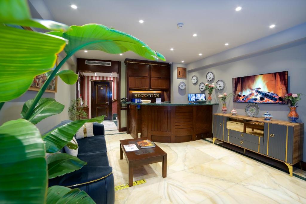 A television and/or entertainment centre at La Vida Old City Hotel