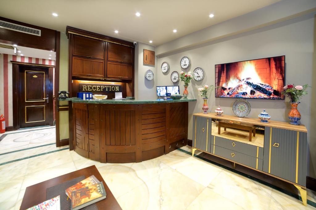 A television and/or entertainment centre at La Vida Old City Hotel