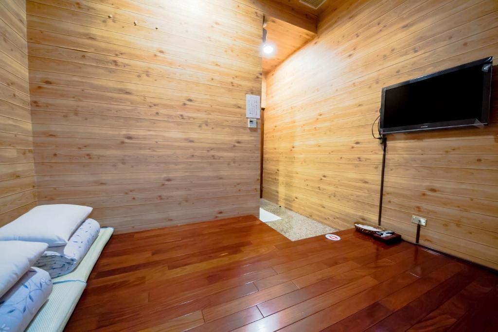 TV a/nebo společenská místnost v ubytování Songyuan B&B